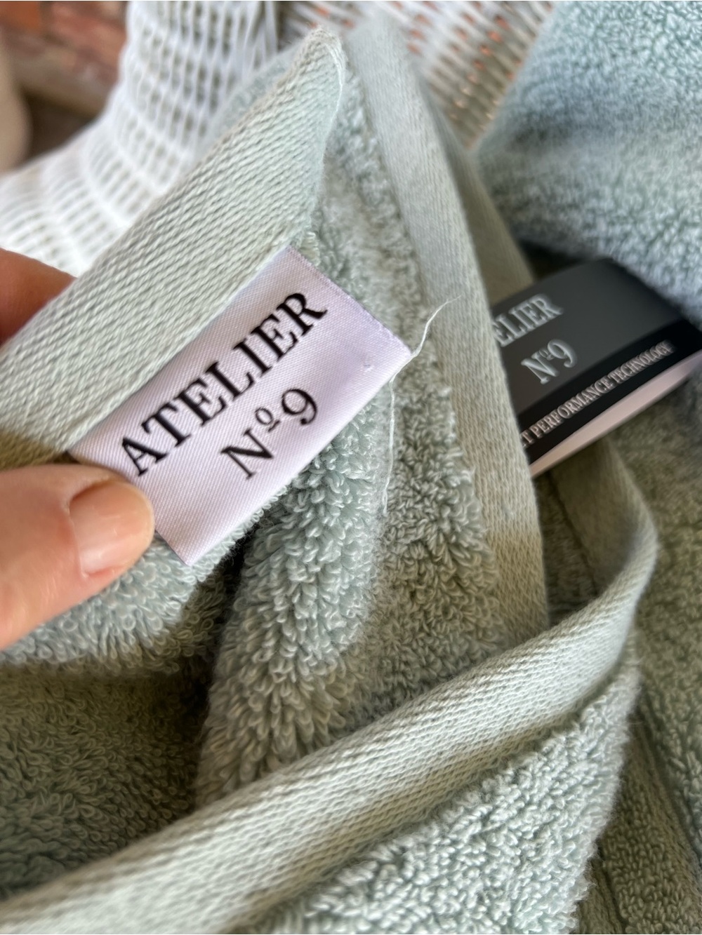 Sage green Atelier No. 9 bath towel features Duet Performance Technology - Picture 7 of 7